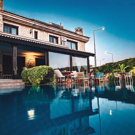 Muup Alaçatı Luaran gambar